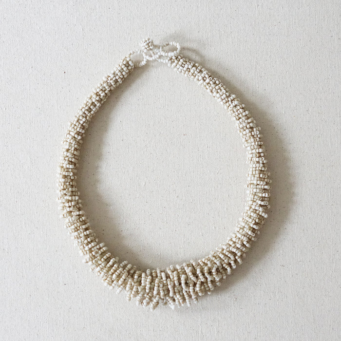 White beaded necklace