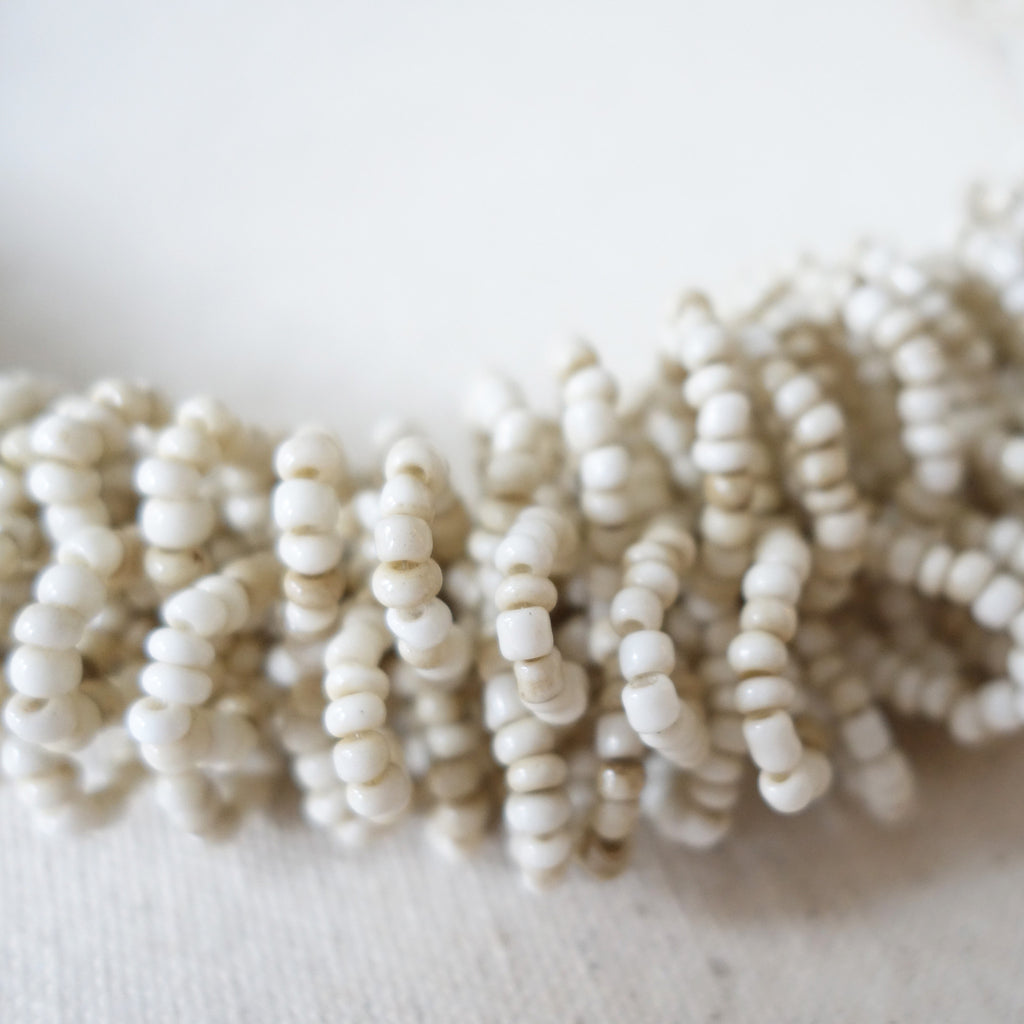 White beaded necklace